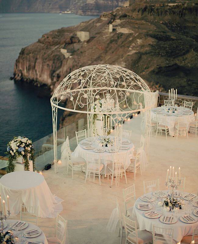 Wedding Beach Destinations: This is A Cavo Ventus Luxury Villa in Santorini, Greece. Check out more romantic beach wedding destinations on Worthminer.com